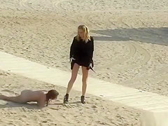 Lezdom disgrace and zapper on the beach
