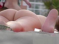 Having fun posing on public nudist beach voyeur hidden cam