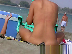 Having fun posing on public nudist beach voyeur hidden cam