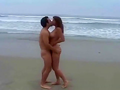 Nude Beach - Voluptuous Brunette Fuck on the Shore