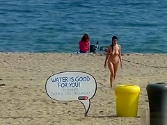 Naked Euro babe disgraced on the beach