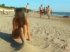 Everyone has clothes on except for this hot nudist