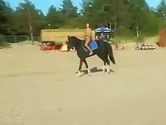 Everyone has clothes on except for this hot nudist