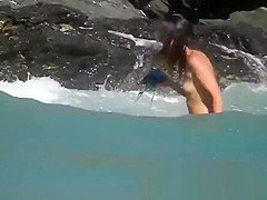 Tempting pussy and ass shots by a nude beach voyeur