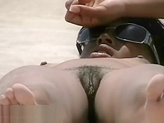 Two hot beach babes crotch shot big tits voyeur video