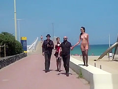 Naked in stockings at beach front
