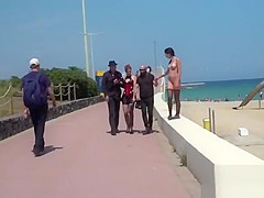 Naked in stockings at beach front