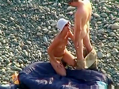 Voyeur On Public Beach. Oral Sex