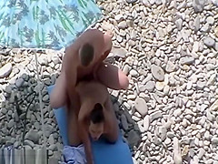 Swingers having threesome at a nude beach caught