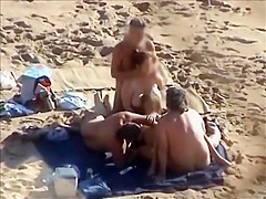 Group sex at a nudist beach