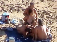 Group sex at a nudist beach