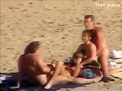 Group sex at a nudist beach