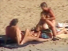 Group sex at a nudist beach