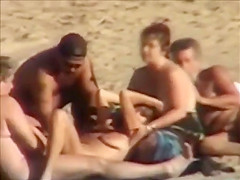 Group sex at a nudist beach