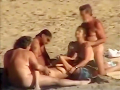 Group sex at a nudist beach