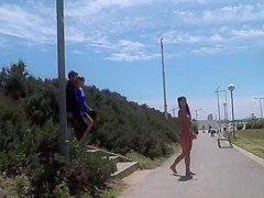 Nude Spanish beauty walked on the beach