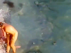 Nude beach blowjob voyeur style