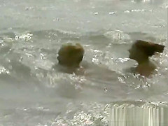 3 Les girls on a nude beach