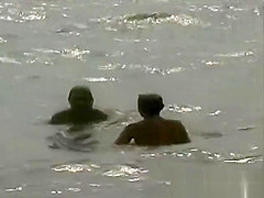 3 Les girls on a nude beach