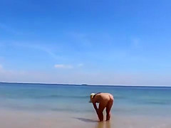 Naked on the beach