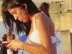 Close up on her tight bikini on the beach! killer ass teen!