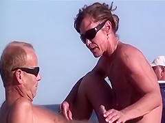 NUDIST BEACH HANDJOB AND BLOWJOB FROM BRUNETTE VOYEUR