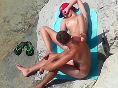 Couple beach play voyeur