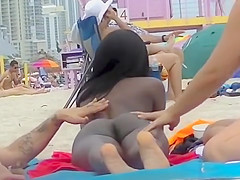 EXHIBITIONIST WIFE #98- HEATHER TAKES HER HUBBY HER GIRLFRIEND TO THE NUDE BEACH! VOYEUR POV