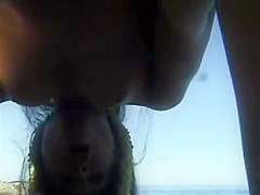 Couple play on Hawaii beach