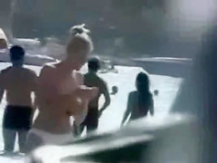 Voyeur films a natural big breasted nudist beach
