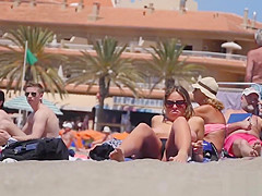 Huge natural tits on the topless beach