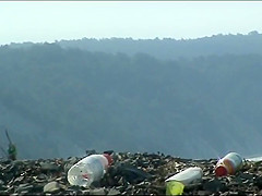 Mature woman with a big ass on a nudist beach