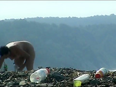 Mature woman with a big ass on a nudist beach