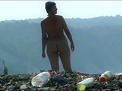 Mature woman with a big ass on a nudist beach