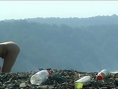 Mature woman with a big ass on a nudist beach
