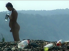 Mature woman with a big ass on a nudist beach