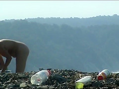 Mature woman with a big ass on a nudist beach