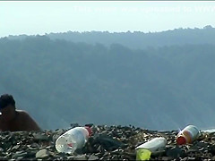 Mature woman with a big ass on a nudist beach