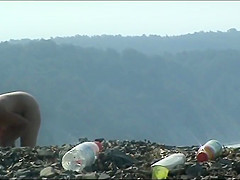Mature woman with a big ass on a nudist beach