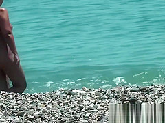 Hot young chick at the beach very hot voyeur hunter