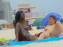 EXHIBITIONIST WIFE #102- HEATHER TAKES HER HUBBY HER GIRLFRIEND TO THE NUDE BEACH! CASUALLY CONVERSING WITH HER LEGS WIDE OPEN FOR ALL TO SEE!