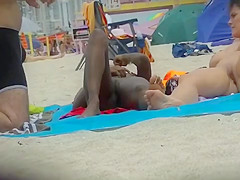 EXHIBITIONIST WIFE #102- HEATHER TAKES HER HUBBY HER GIRLFRIEND TO THE NUDE BEACH! CASUALLY CONVERSING WITH HER LEGS WIDE OPEN FOR ALL TO SEE!