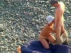 Voyeur on public beach. Oral sex