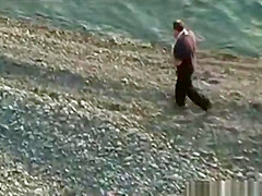 Voyeur on public beach. Oral sex