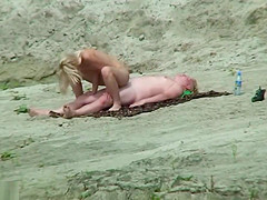 Voyeur spycam on the beach