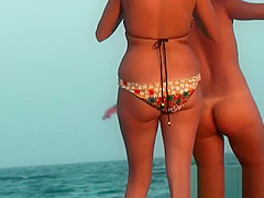 Nude beach voyeur video of hot playful nudists in water
