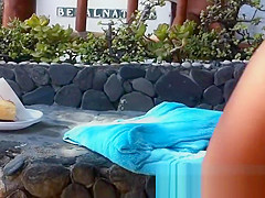 Spying on a cute cutie at the nudist beach voyeur cam