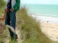 Couple play at the beach