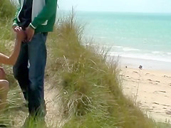 Couple play at the beach