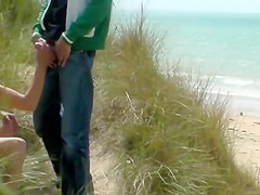 Couple play at the beach